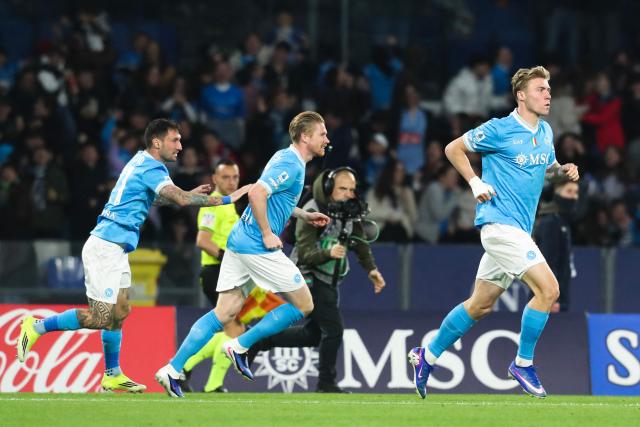 Napoli's Danish forward Rasmus #19 Hojlund (R) celebrates scoring his team's first goal during the Italian Serie A football match between Napoli and Lecce at the Diego Armando Maradona stadium in Naples, southern Italy, on March 14, 2026. (Photo by CARLO HERMANN / AFP)
