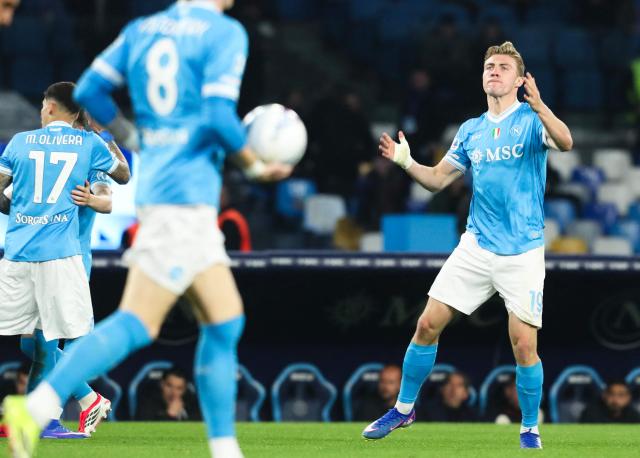 Napoli's Danish forward Rasmus #19 Hojlund celebrates scoring his team's first goal during the Italian Serie A football match between Napoli and Lecce at the Diego Armando Maradona stadium in Naples, southern Italy, on March 14, 2026. (Photo by CARLO HERMANN / AFP)