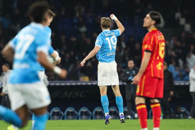 Napoli's Danish forward Rasmus #19 Hojlund celebrates scoring his team's first goal during the Italian Serie A football match between Napoli and Lecce at the Diego Armando Maradona stadium in Naples, southern Italy, on March 14, 2026. (Photo by CARLO HERMANN / AFP)