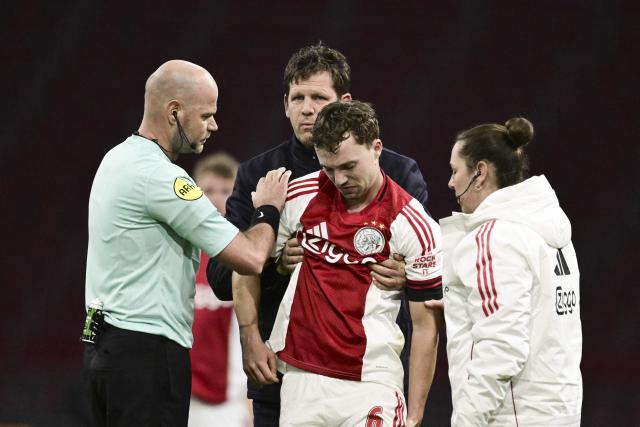 Youri Regeer of AFC Ajax leaves the pitch after an injury during the Dutch Eredivisie match between AFC Ajax and Sparta Rotterdam at the Johan Cruijff Arena  in Amsterdam, the Netherlands on March 14, 2026. (Photo by Olaf Kraak / ANP / AFP) / Netherlands OUT