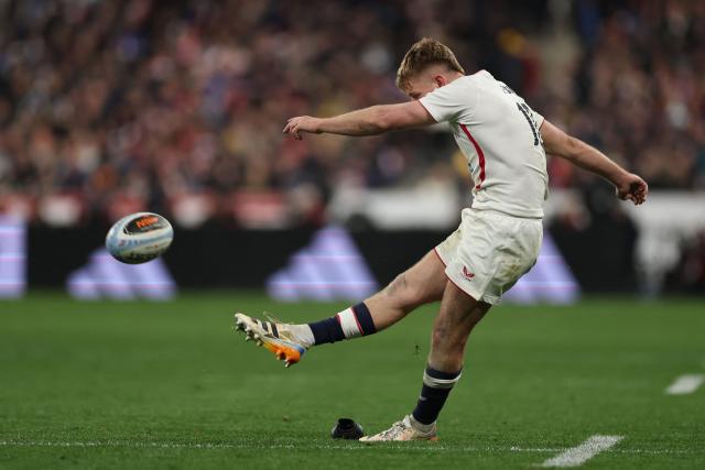 England's fly-half Fin Smith kicks a conversion during the Six Nations international rugby union match between France and England at the Stade de France, in Saint-Denis, north of Paris, on March 14, 2026. (Photo by FRANCK FIFE / AFP)