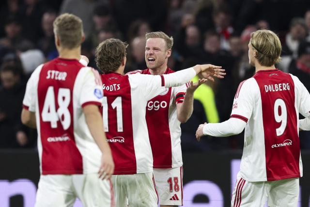 Mika Godts of AFC Ajax, Davy Klaassen of AFC Ajax celebrate the 3-0  during the Dutch Eredivisie match between AFC Ajax and Sparta Rotterdam at the Johan Cruijff Arena  in Amsterdam, the Netherlands on March 14, 2026. (Photo by Sonny Lensen / ANP / AFP) / Netherlands OUT