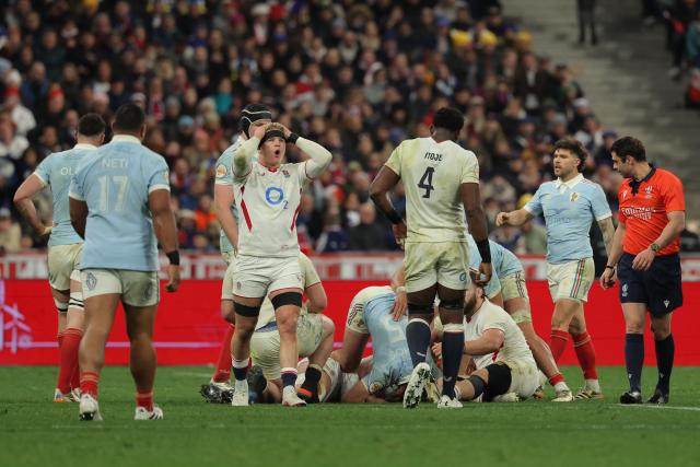 England's number 8 Henry Pollock (C) reacts during of the Six Nations international rugby union match between France and England at the Stade de France, in Saint-Denis, north of Paris, on March 14, 2026. (Photo by Thomas SAMSON / AFP)
