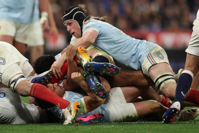 France's lock Thibaud Flament lies on top of a ruck during of the Six Nations international rugby union match between France and England at the Stade de France, in Saint-Denis, north of Paris, on March 14, 2026. (Photo by FRANCK FIFE / AFP)