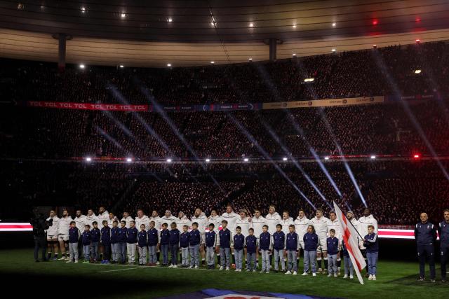 France's players stand for the national anthems ahead of the Six Nations international rugby union match between France and England at the Stade de France, in Saint-Denis, north of Paris, on March 14, 2026. (Photo by Thomas SAMSON / AFP)