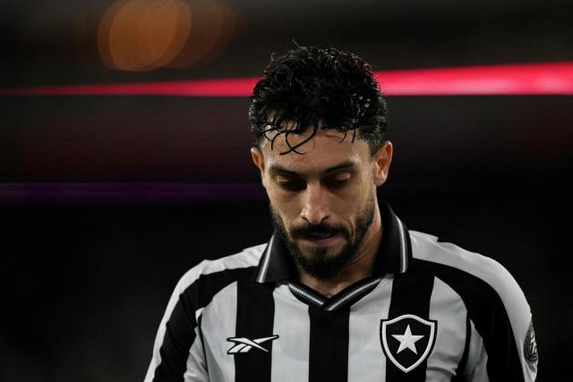 Botafogo's defender #13 Alex Telles reacts during the Brazilian Championship Serie A football match between Botafogo and Flamengo at the Nilton Santos Stadium in Rio de Janeiro, Brazil on March 14, 2026. (Photo by MAURO PIMENTEL / AFP)