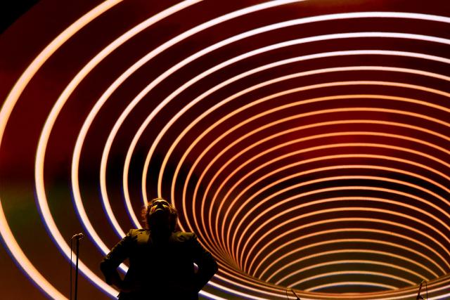 TOPSHOT - Singer Luis Humberto Navejas from Mexican band Enjambre performs on stage during the Vive Latino Music Festival at the Hermanos Rodriguez racetrack in Mexico City on March 14, 2026. (Photo by Rodrigo Oropeza / AFP)