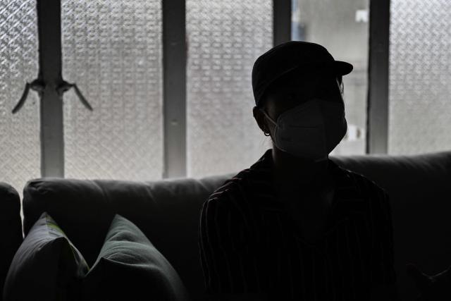 This photo taken on December 3, 2025, shows a case study talking during an interview with AFP in Quezon City, Metro Manila. Abortions are strictly outlawed in the mainly Catholic Philippines, forcing women to turn to a patchwork of providers operating in the online shadows. (Photo by Jam STA ROSA / AFP) / TO GO WITH STORY: Philippines-abortion-health-religion, FOCUS by Ara Eugenio and Pam Castro