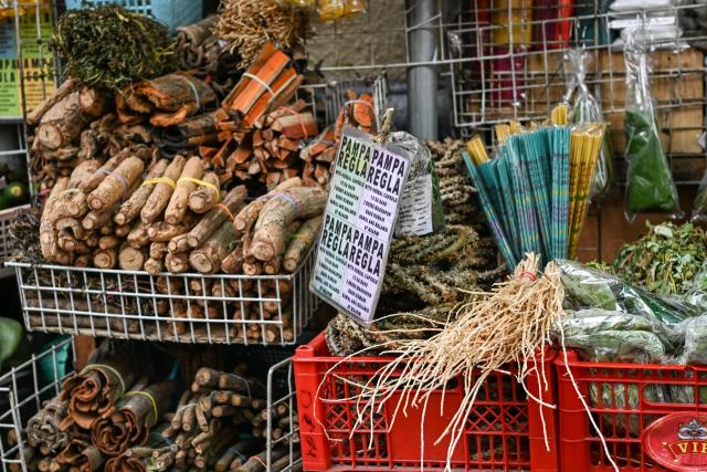 This photo taken on February 13, 2026, shows a stall signage that says “pamparegla” which refers to medication believed to help stimulate menstruation along a street in Manila. Abortions are strictly outlawed in the mainly Catholic Philippines, forcing women to turn to a patchwork of providers operating in the online shadows. (Photo by Jam STA ROSA / AFP) / TO GO WITH STORY: Philippines-abortion-health-religion, FOCUS by Ara Eugenio and Pam Castro
