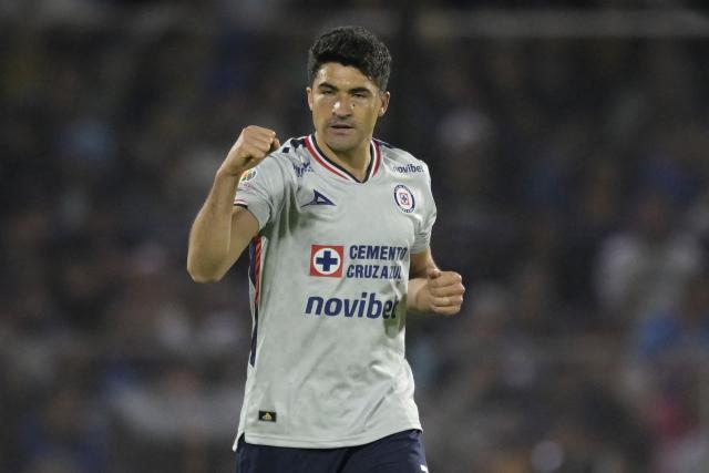 Cruz Azul's forward #07 Nicolas Ibanez celebrates scoring the opening goal during the Liga MX Clausura match between Pumas and Cruz Azul at the Olimpico Universitario Stadium in Mexico City on March 14, 2026. (Photo by Alfredo ESTRELLA / AFP)