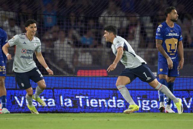 Cruz Azul's forward #07 Nicolas Ibanez celebrates scoring the opening goal during the Liga MX Clausura match between Pumas and Cruz Azul at the Olimpico Universitario Stadium in Mexico City on March 14, 2026. (Photo by Alfredo ESTRELLA / AFP)
