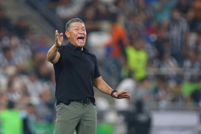 (FILES) Leon's head coach Ignacio Ambriz (R) gestures during the Liga MX Clausura tournament football match between Monterrey and Leon at BBVA Stadium in Monterrey, Mexico on February 14, 2026. Mexican coach Ignacio Ambriz resigned as head coach of Leon football club on March 14, 2026, following a 3-0 home loss to Tijuana at the Nou Camp Stadium on the eleventh matchday of the 2026 Clausura tournament. (Photo by Julio Cesar AGUILAR / AFP)