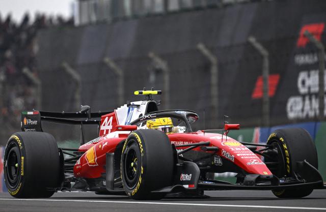 Ferrari's British driver Lewis Hamilton drives during the Formula One Chinese Grand Prix at the Shanghai International Circuit in Shanghai on March 15, 2026. (Photo by JADE GAO / AFP)