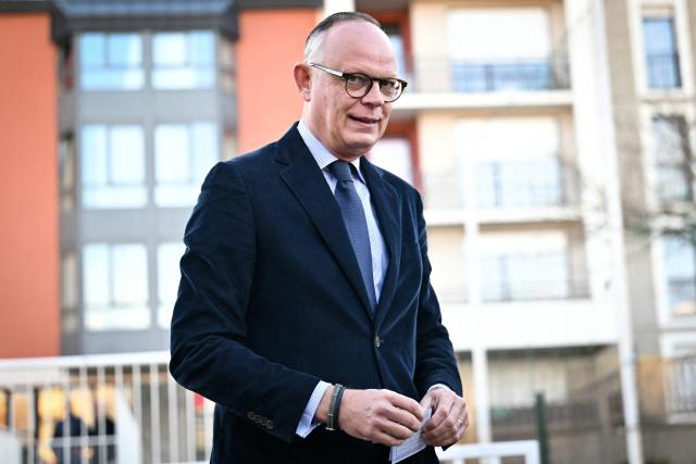 Le Havre incumbent mayor and center-right Horizons party candidate for his re-election Edouard Philippe arrives at the voting station prior to cast his ballot during the first round of France's 2026 municipal elections in Le Havre, northeastern France, on March 15, 2026. (Photo by Lou BENOIST / AFP)