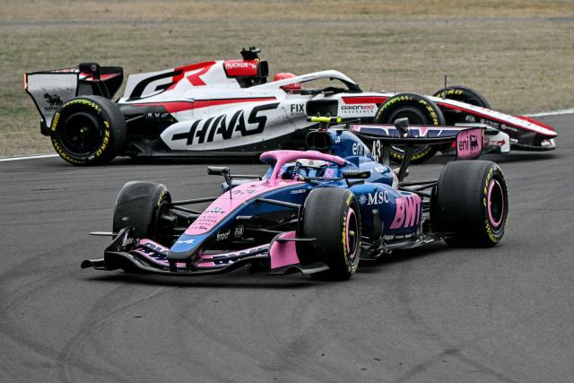 Alpine's Argentine driver Franco Colapinto (front) collides with Haas F1 Team's French driver Esteban Ocon during the Formula One Chinese Grand Prix at the Shanghai International Circuit in Shanghai on March 15, 2026. (Photo by Greg Baker / AFP)