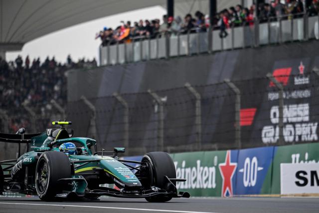 Aston Martin's Spanish driver Fernando Alonso drives during the Formula One Chinese Grand Prix at the Shanghai International Circuit in Shanghai on March 15, 2026. (Photo by JADE GAO / AFP)