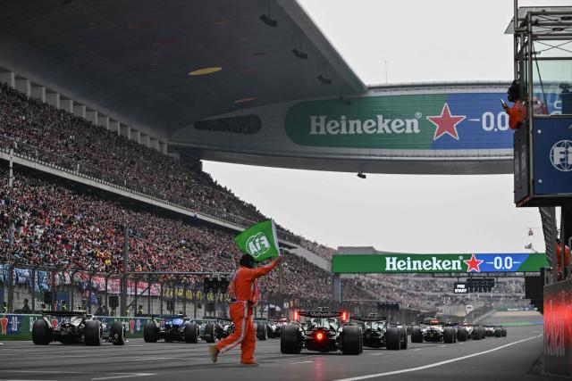 Drivers take the start of the Formula One Chinese Grand Prix at the Shanghai International Circuit in Shanghai on March 15, 2026. (Photo by Jade Gao / AFP)