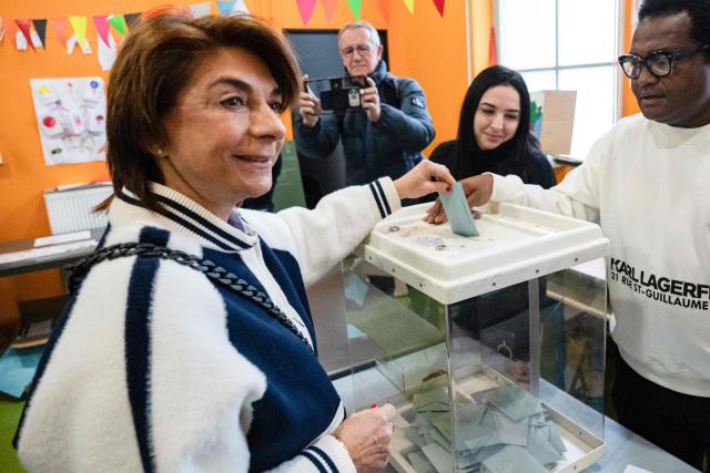 Marseille’s right-wing Les Republicains (LR) party mayoral candidate Martine Vassal casts her ballot during the first round of France's 2026 municipal elections in Marseille, southern France, on March 15, 2026. (Photo by Elodie CLEMENT / AFP)