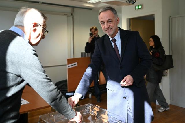 Socialist party (PS) mayoral candidate in Paris, Emmanuel Gregoire casts his vote during the first round of France's 2026 municipal elections in Paris on March 15, 2026. (Photo by Bertrand GUAY / POOL / AFP)