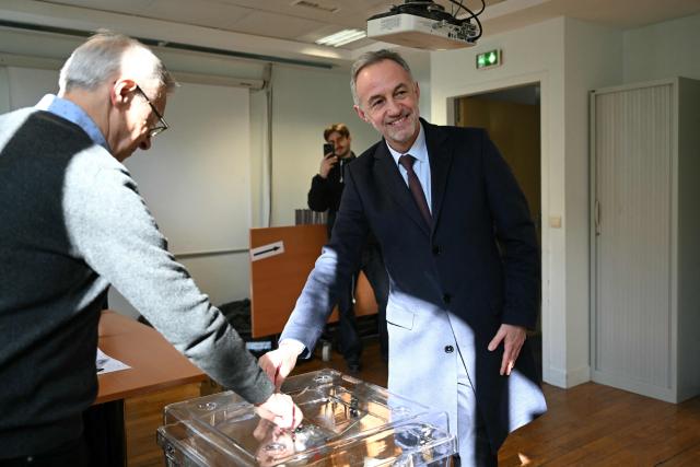 Socialist party (PS) mayoral candidate in Paris, Emmanuel Gregoire casts his vote during the first round of France's 2026 municipal elections in Paris on March 15, 2026. (Photo by Bertrand GUAY / POOL / AFP)