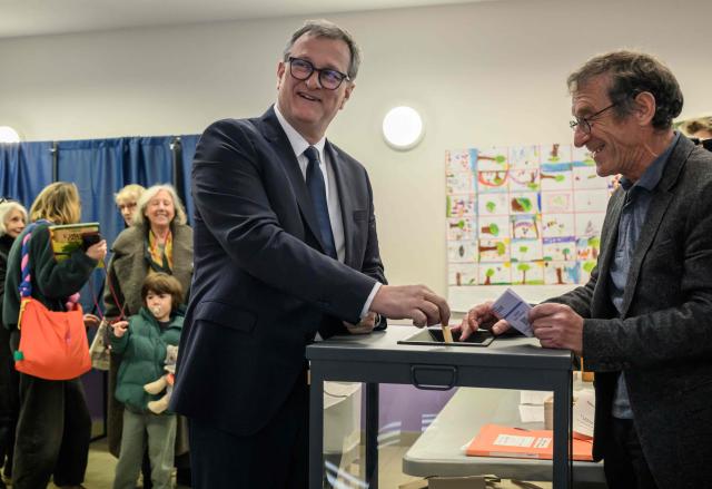 Incumbent mayor of Perpignan and far-right Rassemblement National (RN) party candidate, Louis Aliot casts his vote during the first round of France's 2026 municipal elections in Perpignan, southwestern France, on March 15, 2026. (Photo by Ed JONES / AFP)