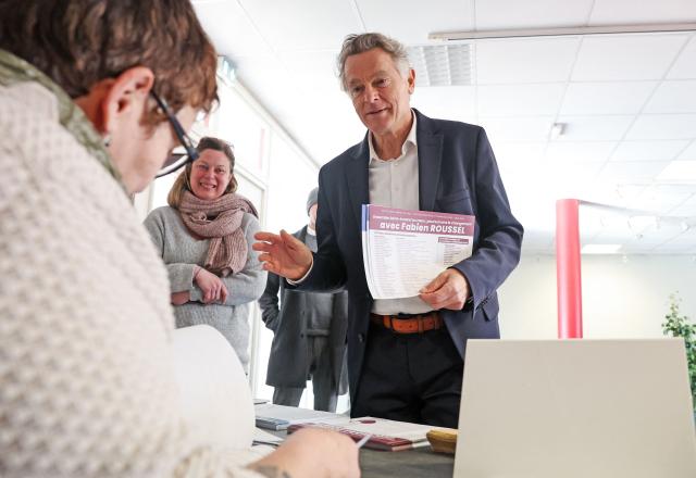 Communist Party (PC) mayoral candidate Fabien Roussel reacts as he arrives to cast his ballot during the first round of France's 2026 municipal elections in Saint-Amand-les-Eaux, northern France on March 15, 2026. (Photo by Francois LO PRESTI / AFP)