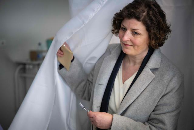 Incumbent mayor of Strasbourg and Les Ecologistes candidate for re-election Jeanne Barseghian leaves the polling booth before casting her ballot during the first round of France's 2026 municipal elections in Strasbourg, eastern France on March 15, 2026. (Photo by SEBASTIEN BOZON / AFP)