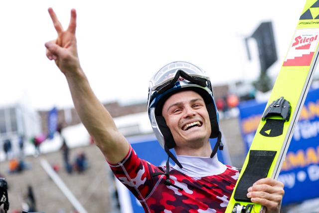 Austria's Johannes Lamparter celebrates winning the jumping in the Men's Individual Gundersen Large Hill HS134 at the FIS Nordic Combined World Cup in Holmenkollen, Oslo, Norway on March 15, 2026. (Photo by Christoffer Andersen / NTB / AFP) / Norway OUT