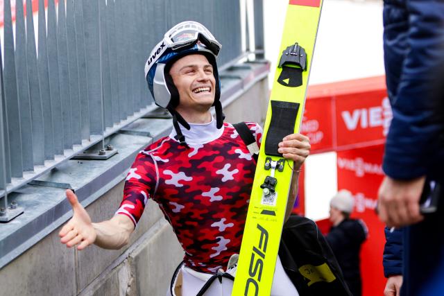 Austria's Johannes Lamparter celebrates winning the jumping in the Men's Individual Gundersen Large Hill HS134 at the FIS Nordic Combined World Cup in Holmenkollen, Oslo, Norway on March 15, 2026. (Photo by Christoffer Andersen / NTB / AFP) / Norway OUT
