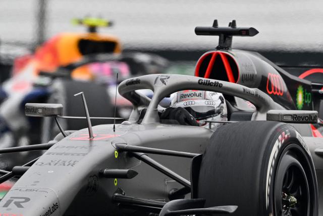 Audi's German driver Nico Hulkenberg drives during the Formula One Chinese Grand Prix at the Shanghai International Circuit in Shanghai on March 15, 2026. (Photo by Hector RETAMAL / AFP)