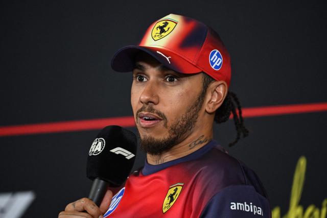 Third-placed Ferrari's British driver Lewis Hamilton attends a press conference after the Formula One Chinese Grand Prix at the Shanghai International Circuit in Shanghai on March 15, 2026. (Photo by Jade GAO / AFP)