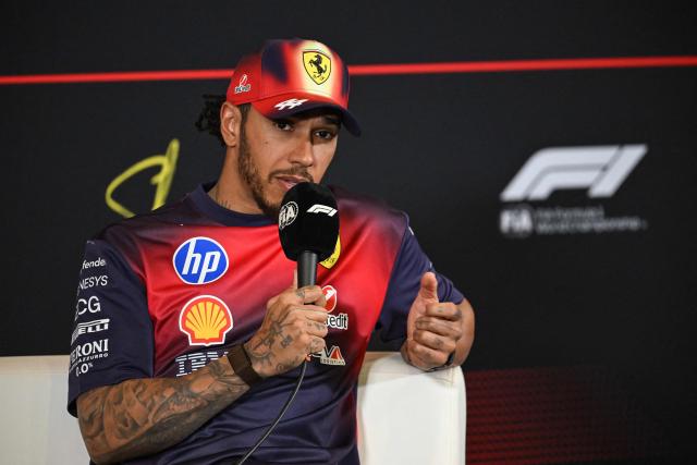 Third-placed Ferrari's British driver Lewis Hamilton attends a press conference after the Formula One Chinese Grand Prix at the Shanghai International Circuit in Shanghai on March 15, 2026. (Photo by Jade GAO / AFP)