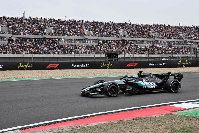 Mercedes’ British driver George Russell drives during the Formula One Chinese Grand Prix at the Shanghai International Circuit in Shanghai on March 15, 2026. (Photo by Hector RETAMAL / AFP)