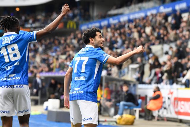 KRC Genk's Moroccan defender #77 Zakaria El Ouahdi celebrates after scoring a goal during the Belgian Pro League football match between KRC Genk and Sint-Truidense VV at the Cegeka Arena in Genk on March 15, 2026. (Photo by JILL DELSAUX / Belga / AFP) / Belgium OUT