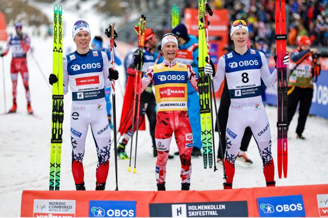(L-R) Second-placed Norway's Jens Luras Oftebro, first-placed Austria's Johannes Lamparter and third-placed Norways' Einar Luras Oftebro celebrate after winning the Men's cross-country race at the FIS Nordic Combined World Cup in Holmenkollen, Oslo, Norway on March 15, 2026. (Photo by Christoffer Andersen / NTB / AFP) / Norway OUT
