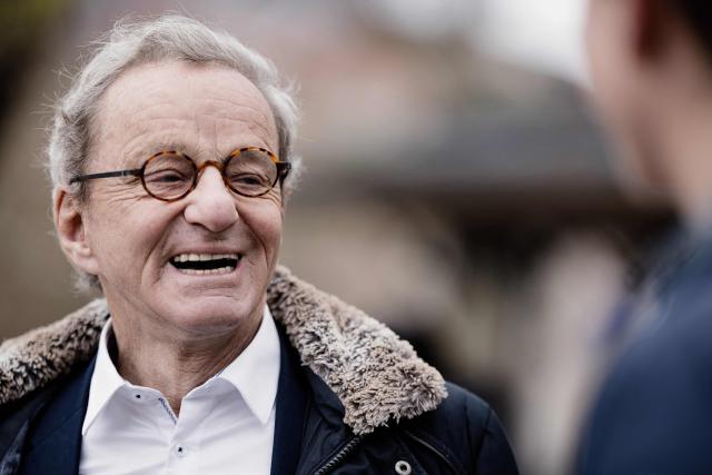 Former Mayor of Grenoble and right-wing Les Republicains (LR) party candidate for his re-election Alain Carignon reacts after leaving casting his ballot outside the polling station during the first round of France's 2026 municipal elections in Grenoble, central France on March 15, 2026. (Photo by Maxime GRUSS / AFP)