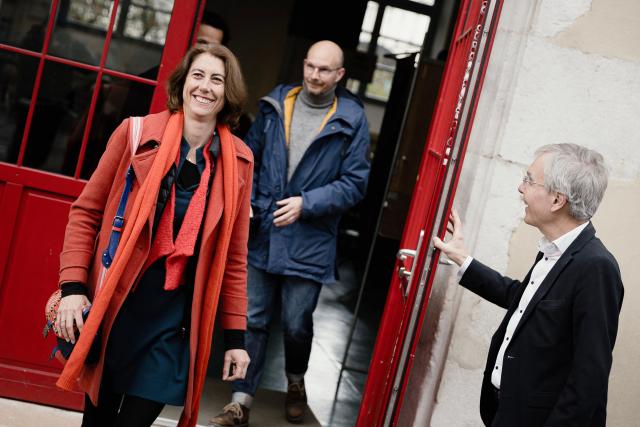 Green Party and left-wing alliance mayoral candidate for Grenoble Laurence Ruffin (L) leaves a polling station after voting during the first round of France's 2026 municipal elections in Grenoble, southeastern France, on March 15, 2026. (Photo by Maxime GRUSS / AFP)