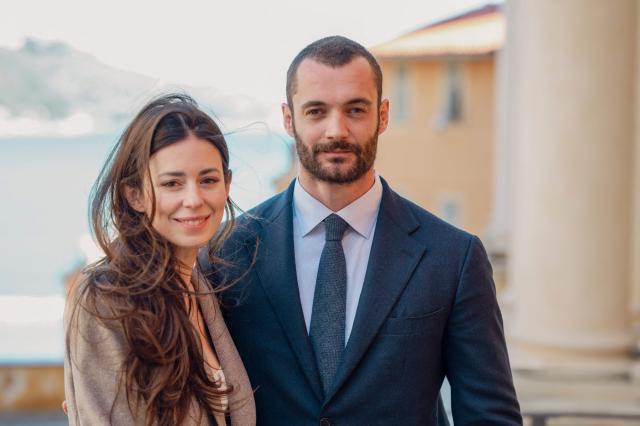 Menton's right-wing coalition "Renouveau Mentonnais" (Menton Revival) mayoral candidate, Louis Sarkozy (R) and his wife Natali Husic (L) poses during the first round of France's 2026 municipal elections in Menton, southeastern France on March 15, 2026. (Photo by Frederic DIDES / AFP)