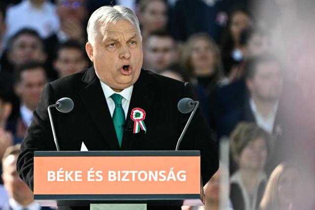 Hungarian Prime Minister Viktor Orban makes a speech in front of the Parliament building during a campaign rally organised by Hungary's ruling Fidesz party in Budapest, Hungary on March 15, 2026, on the 178th anniversary of the Hungarian Revolution and War of Independence of 1848-1849. The 1848-1849 revolution in the Kingdom of Hungary grew into a war for independence from the Austrian Empire, ruled by the Habsburg dynasty. (Photo by Attila KISBENEDEK / AFP)
