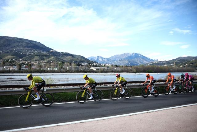Team Visma - Lease a Bike's Danish rider Jonas Vingegaard (3rd L) rides with the pack during the 8th and final stage of the Paris-Nice cycling race, 129.2 km between Nice and Nice, on March 15, 2026. (Photo by Anne-Christine POUJOULAT / AFP)