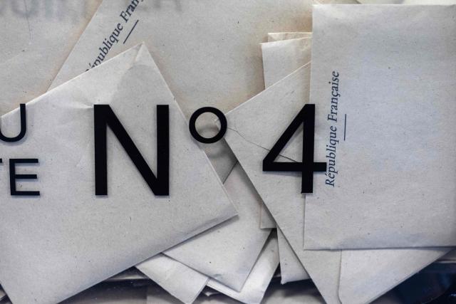 This photograph shows a ballot box at a polling station during the first round of France's 2026 municipal elections in Quimper on March 15, 2026. (Photo by Fred TANNEAU / AFP)