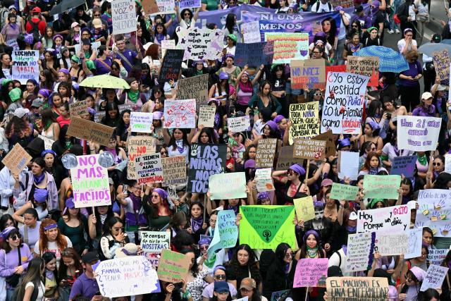 Hundreds of women gather before the start of a march to commemorate the Internatiomal Women's Day in Bogota on March 15, 2026. (Photo by Diana SANCHEZ / AFP)