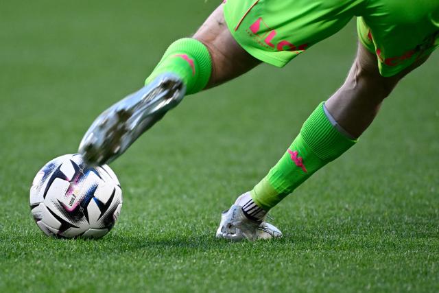 Metz's Danish goalkeeper #01 Jonathan Frost Fischer kicks the ball during the French L1 football match between FC Metz and Toulouse FC at the Stade Saint-Symphorien in Longeville-les-Metz, eastern France, on March 15, 2026. (Photo by Jean-Christophe VERHAEGEN / AFP)