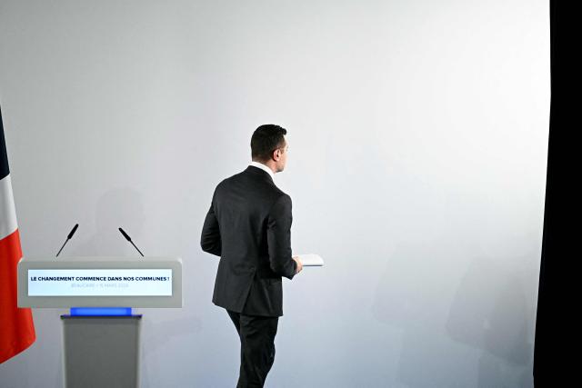 French far-right Rassemblement National (RN) party's President Jordan Bardella leaves after delivering a speech following the first round of France's 2026 municipal elections in Beaucaire, south-eastern France on March 15, 2026. (Photo by Gabriel BOUYS / AFP)