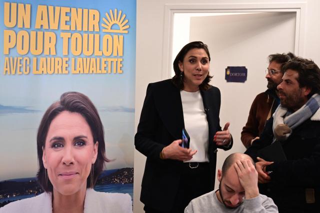 Toulon’s far-right Rassemblement National (RN) party mayoral candidate, Laure Lavalette reacts as she waits for the first results of the first round of France's 2026 municipal elections at hter campaign headquarters in Toulon, southern France, on March 15, 2026. (Photo by Miguel MEDINA / AFP)