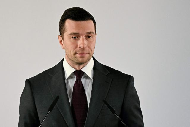 French far-right Rassemblement National (RN) party's President Jordan Bardella delivers a speech after the first round of France's 2026 municipal elections in Beaucaire, south-eastern France on March 15, 2026. (Photo by Gabriel BOUYS / AFP)