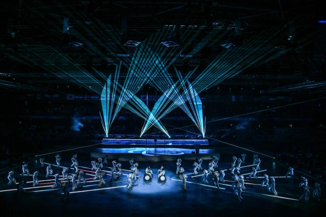 Performers take part in the Milano Cortina 2026 Winter Paralympic Games closing ceremony at the Olympic Ice Stadium in Cortina d'Ampezzo, on March 15, 2026. (Photo by Jeff PACHOUD / AFP)