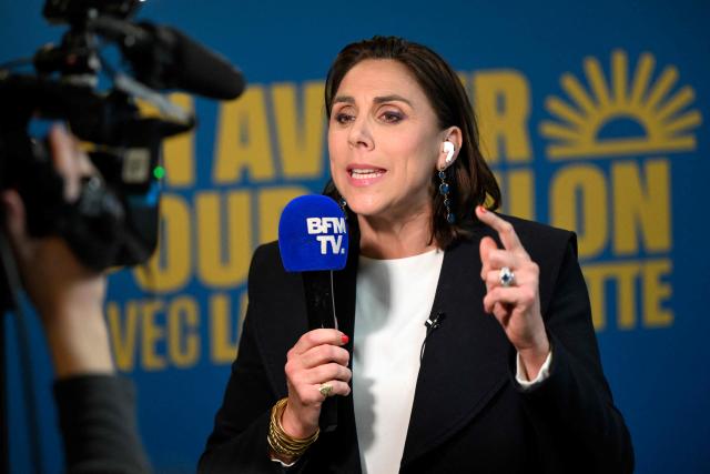 Toulons far-right Rassemblement National (RN) party mayoral candidate, Laure Lavalette talks to journalists at her campaign headquarters after the first results of the first round of France's 2026 municipal elections in Toulon, southern France, on March 15, 2026. Lavalette has emerged as the frontrunner in the first round of the municipal elections in Toulon, with between 39.4% and 42% of the vote according to estimates, ahead of the outgoing mayor in a city where the left will not be contesting the second round. (Photo by Miguel MEDINA / AFP)
