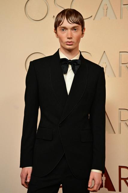 British model Calum Harper attends the 98th Annual Academy Awards at the Dolby Theatre in Hollywood, California on March 15, 2026. (Photo by Frederic J. Brown / AFP)