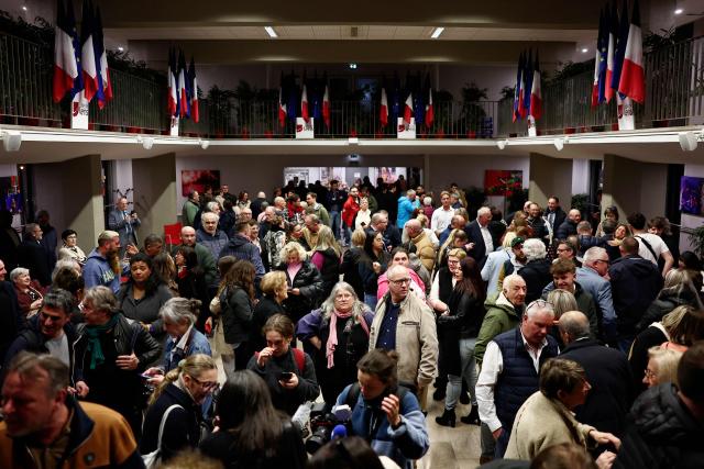 Supporters gather at the City Hall before the results of the first round of France's 2026 municipal elections in Lens on March 15, 2026. Lens' Socialist outgoing mayor Sylvain Robert was reelected. (Photo by Sameer AL-DOUMY / AFP)